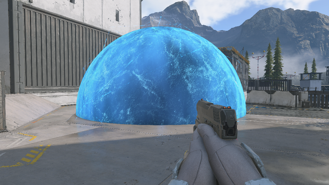 First person view of the player holding a Sidekick Pistol looking at an active Shroud Screen from the outside.