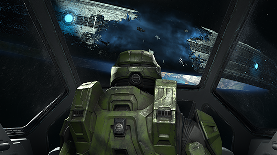 Screenshot from Halo Infinite. The Master Chief looks at the damaged ring of Zeta Halo from the cockpit of a Pelican.